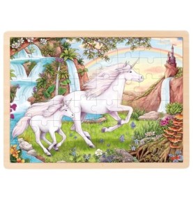 Puzzle licorne en bois monté dans son cadre : licorne blanche, poulain, cascades, arc-en-ciel et château