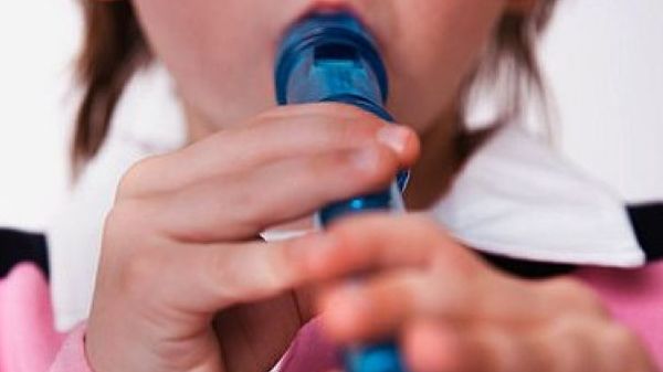 Child playing the flute